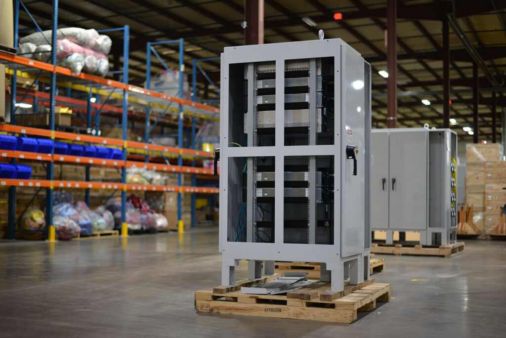 Industrial electrical control cabinet assembled for scalable production inside a contract manufacturing facility.