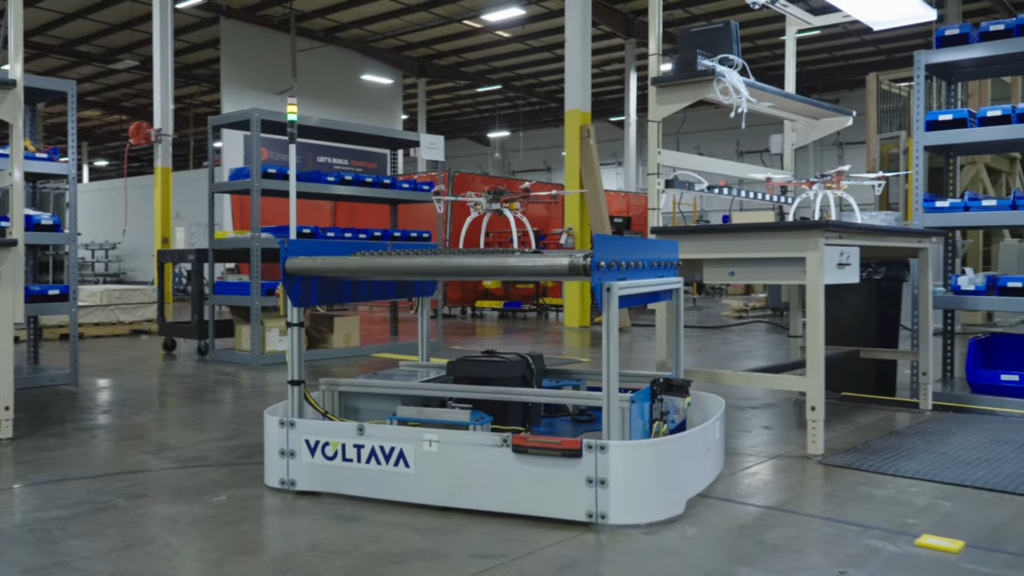 FLEXembly autonomous mobile workcell operating inside Kinetyc’s advanced manufacturing facility to support flexible assembly and material handling workflows.